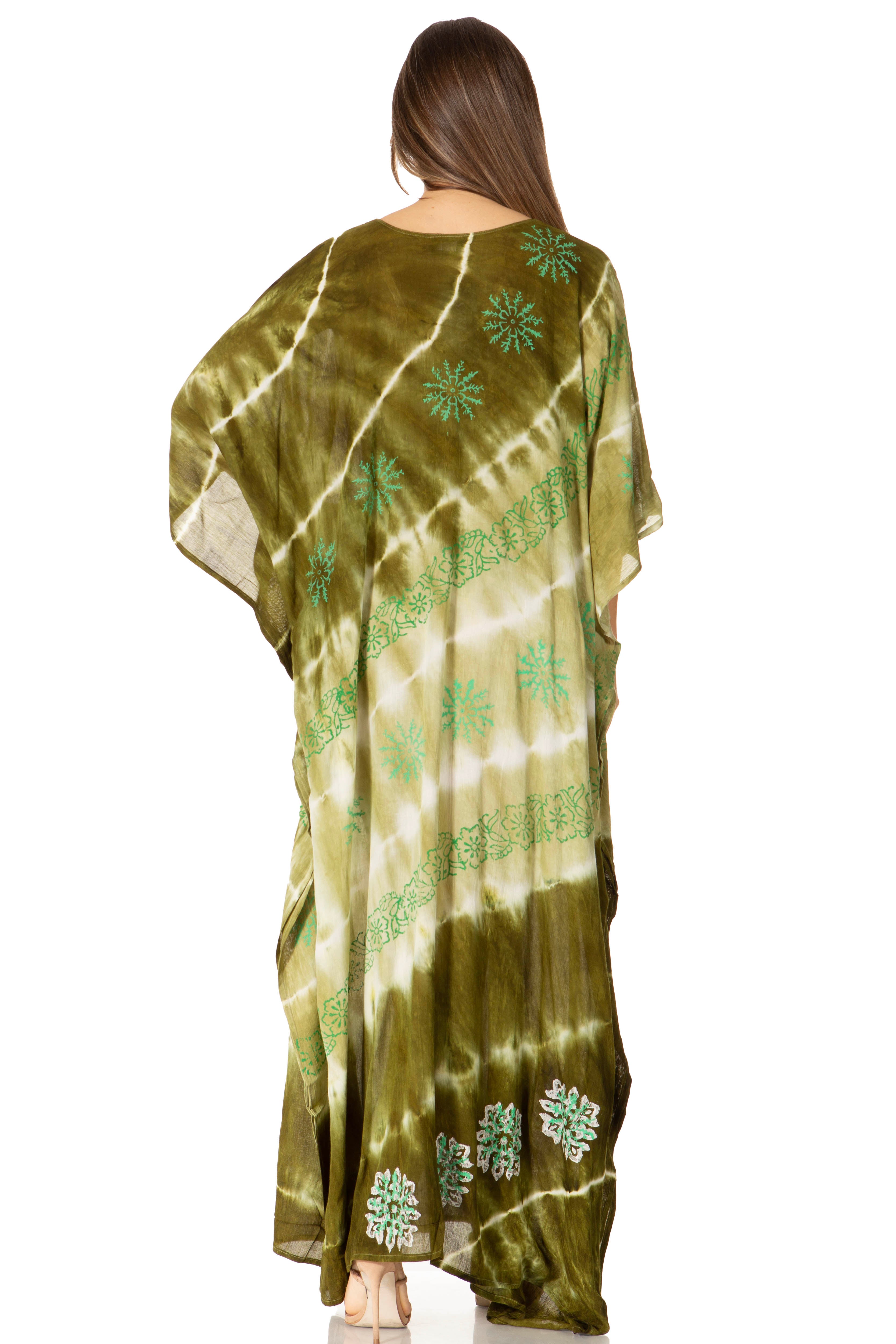 Woman wearing a green and white tie-dye saree with floral patterns on a white background