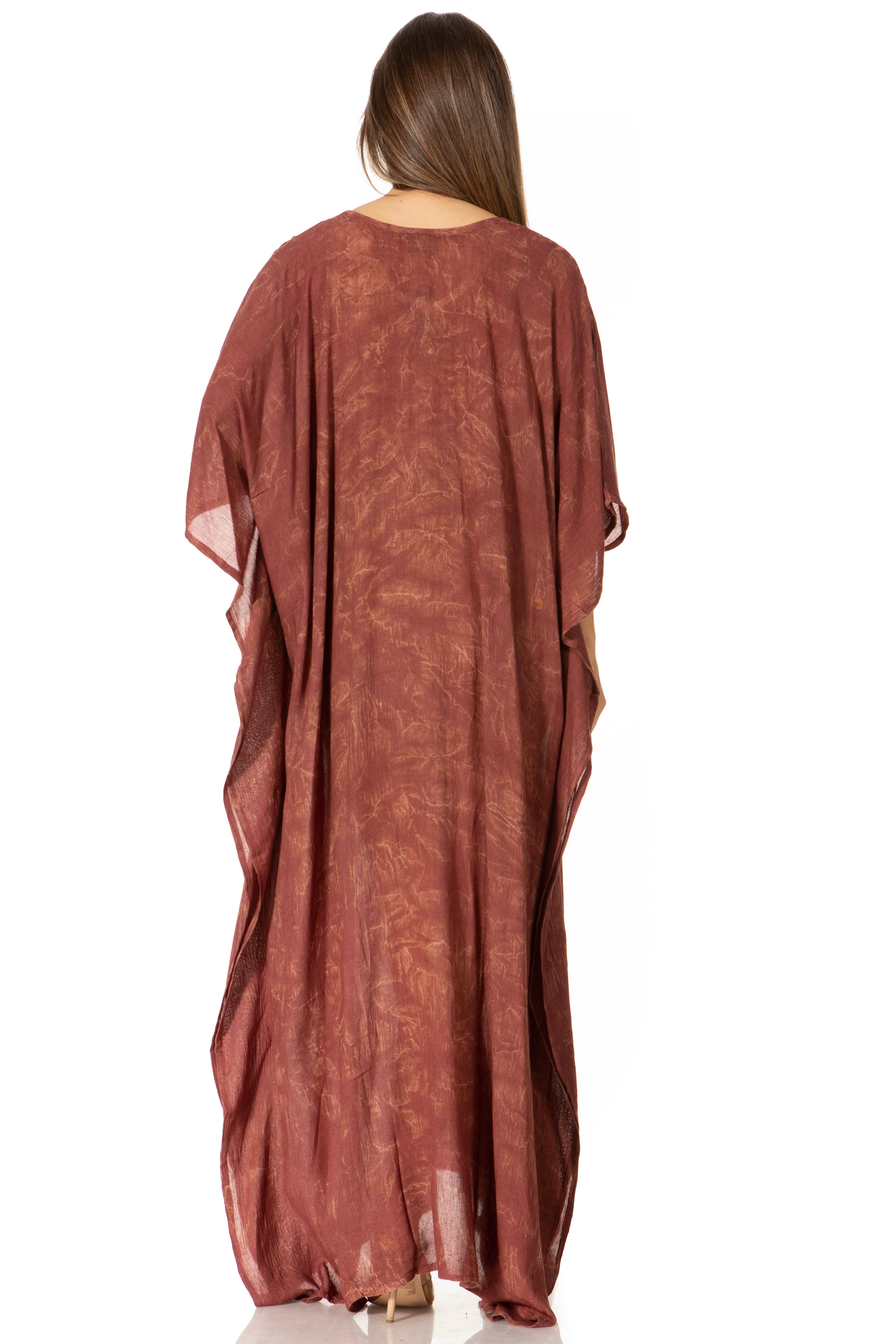 Brown maxi dress with a draped design on a white background