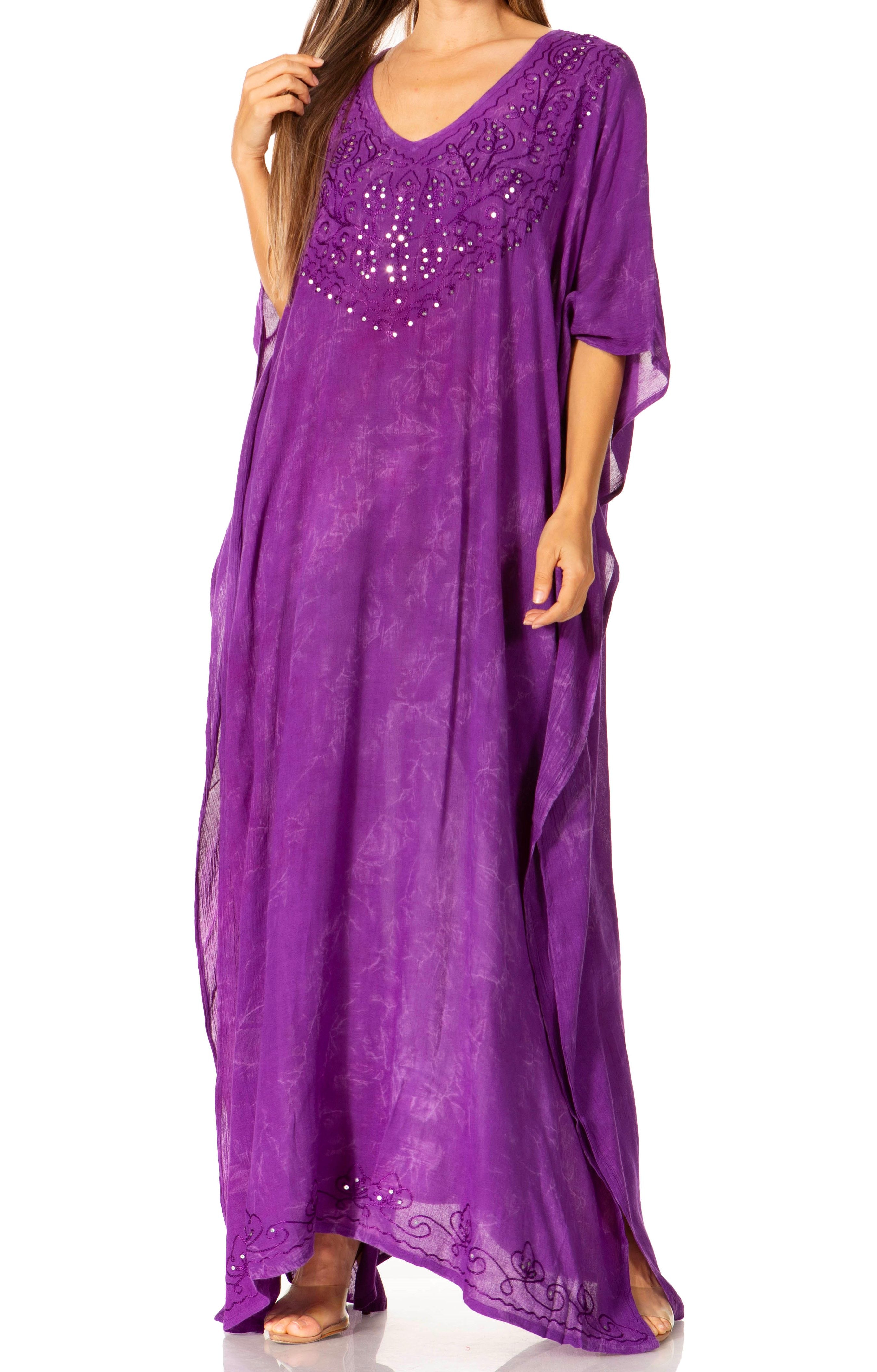 Purple caftan with sequin embellishments on a white background