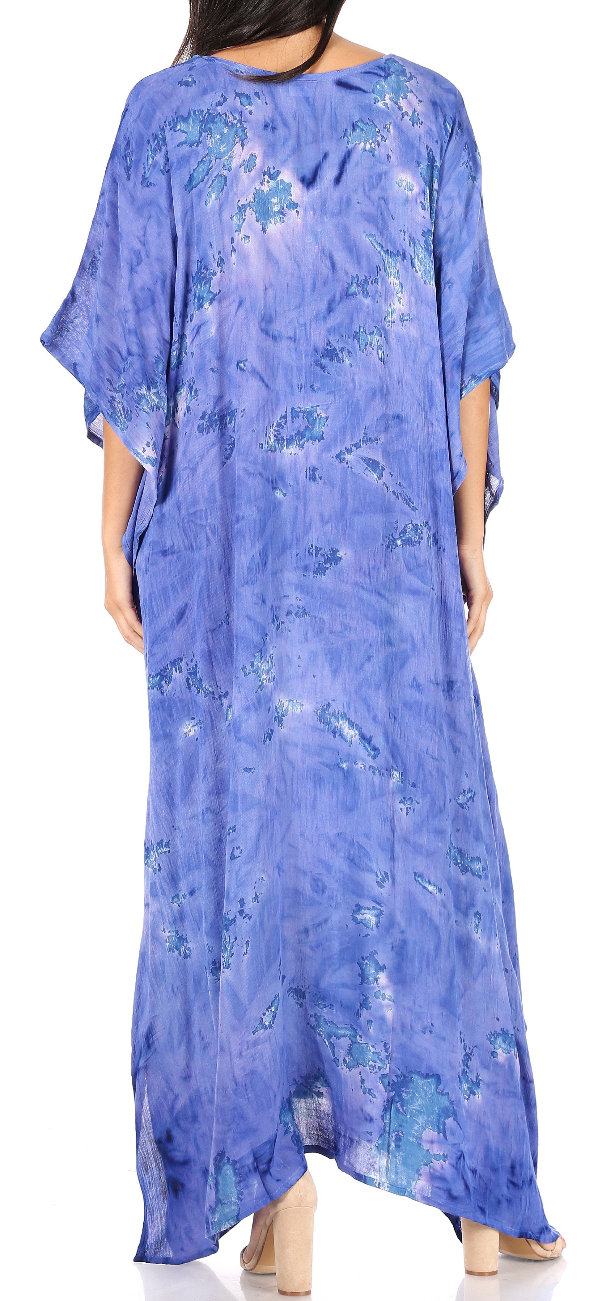 Blue floral caftan worn by a person, with a plain background