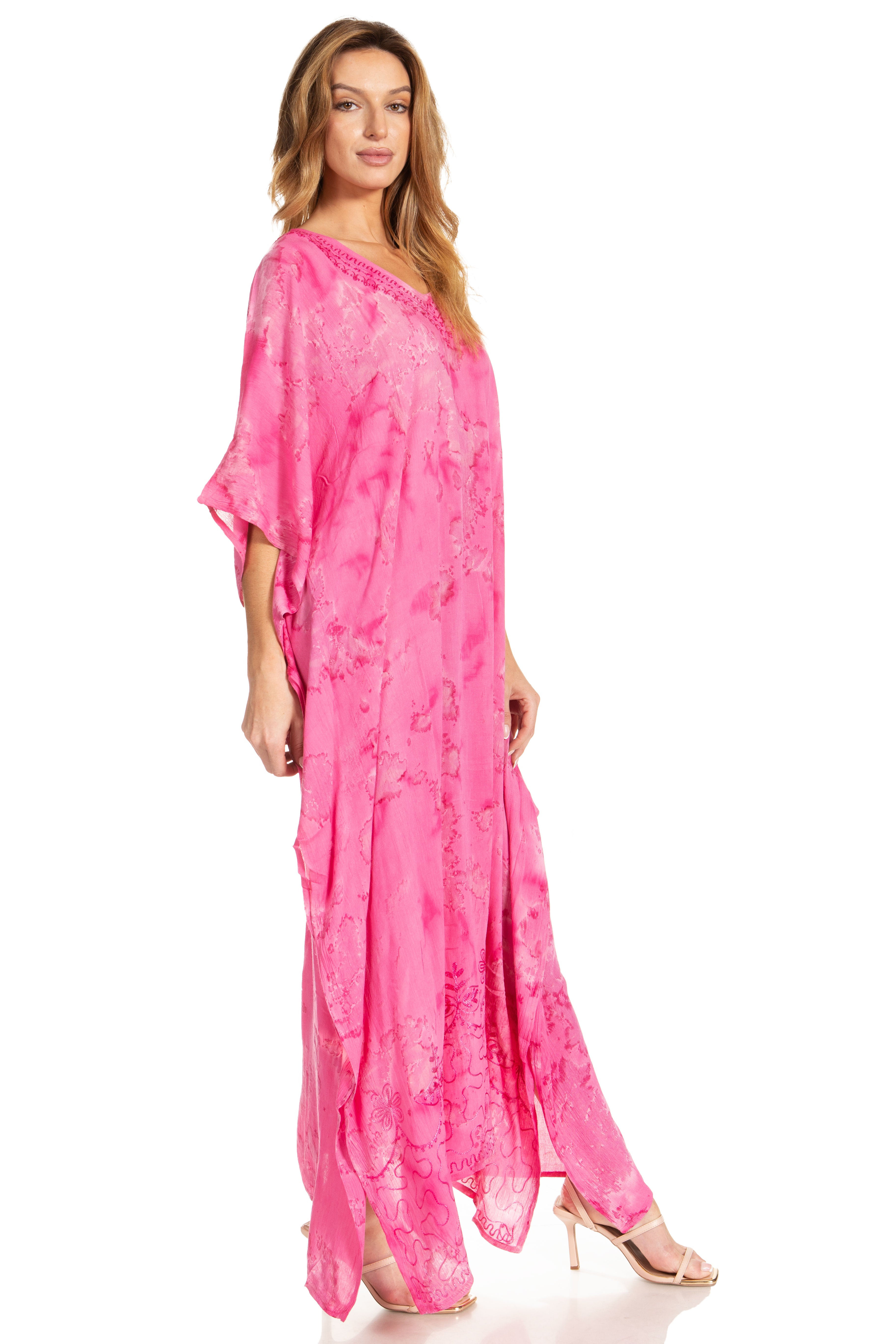 Woman wearing a pink floral dress on a white background