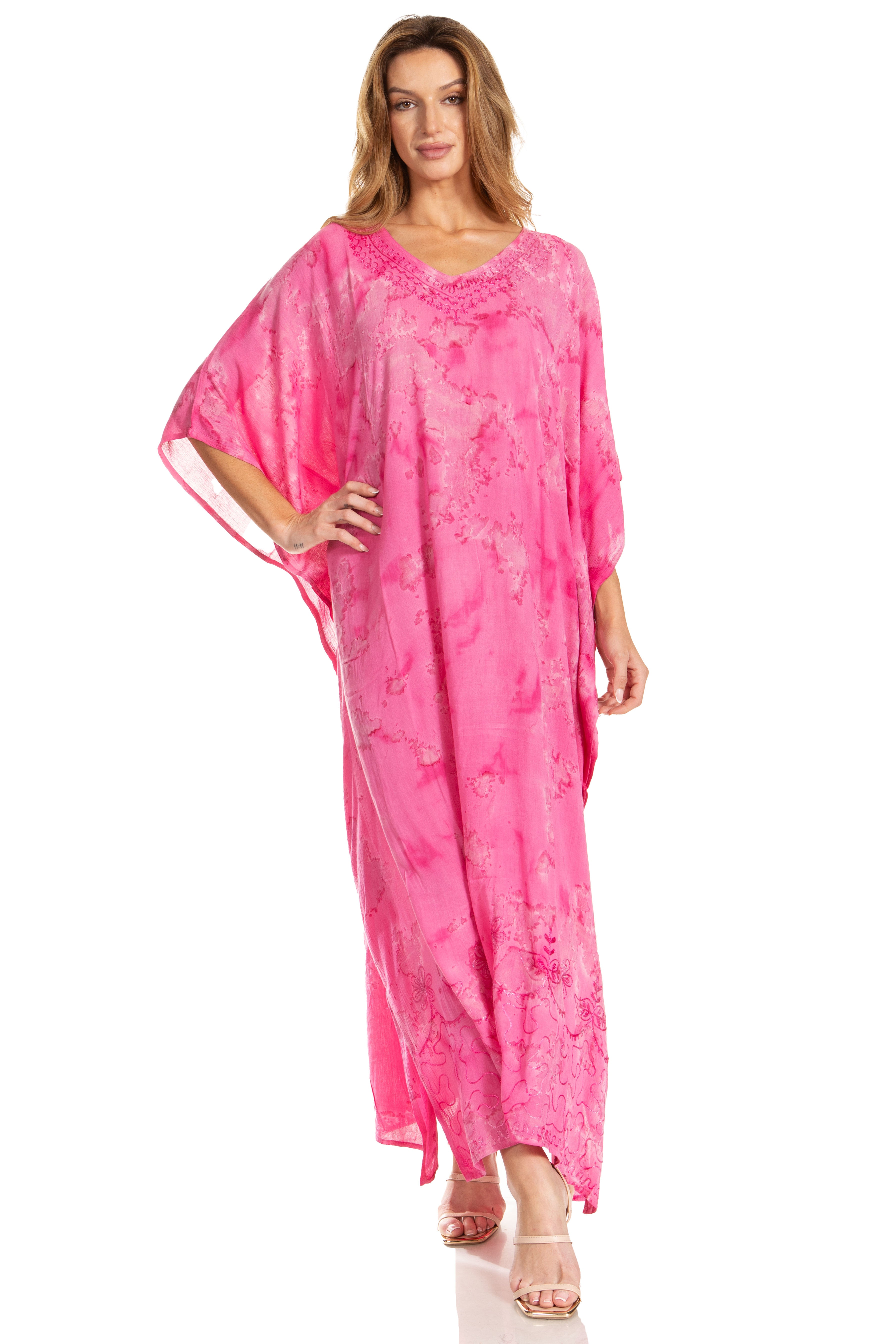 Woman wearing a pink caftan on a white background