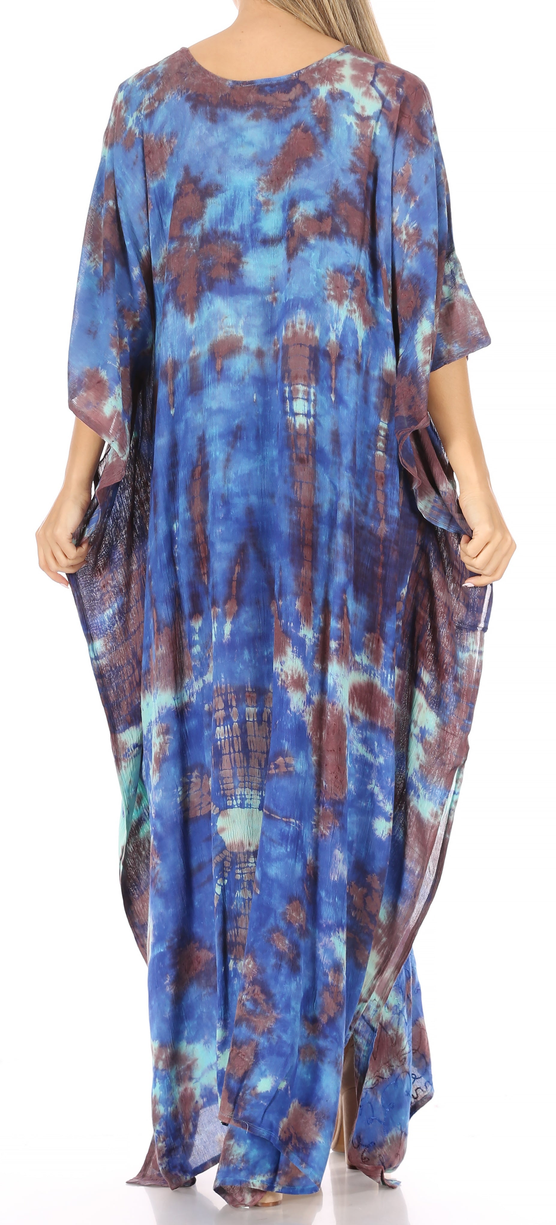 Long, patterned dress with a blue and brown tie-dye design on a white background