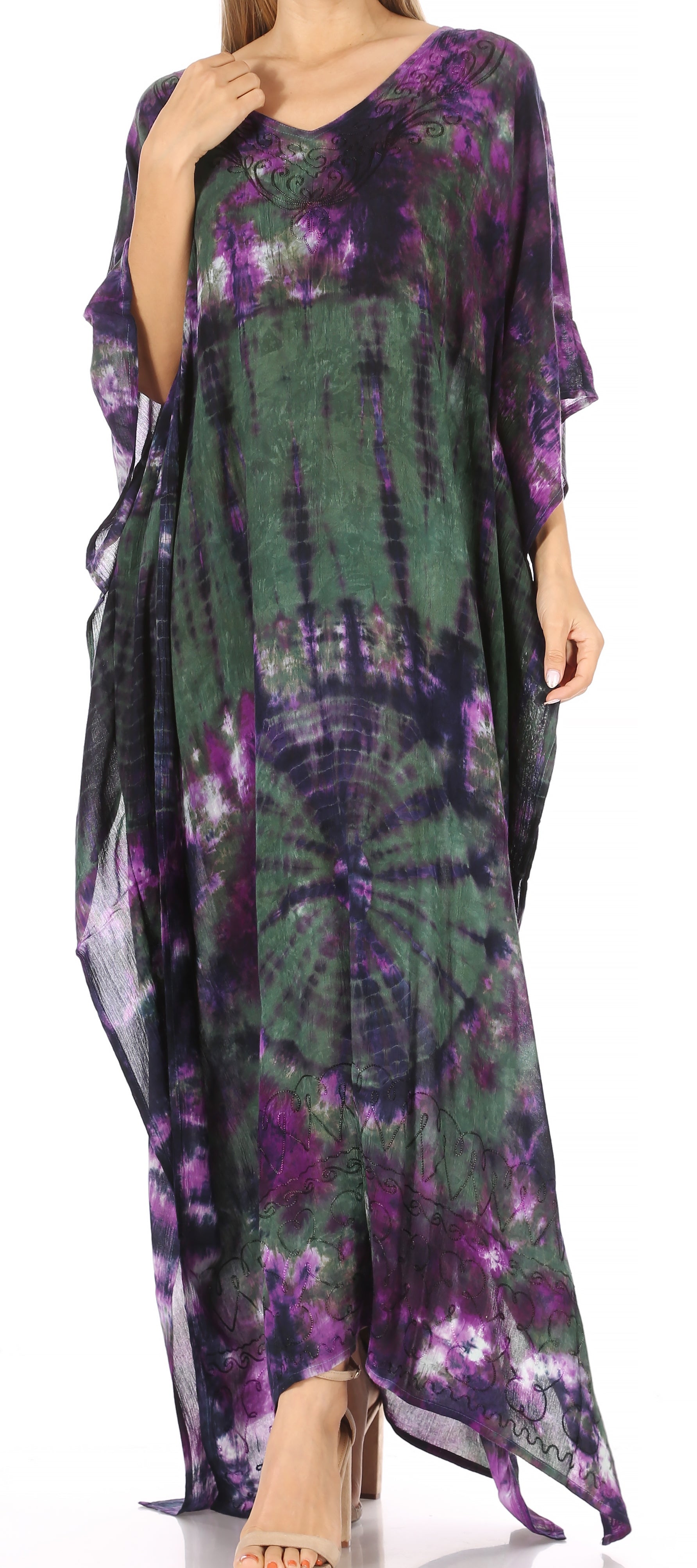 Long, tie-dye dress with purple and green patterns on a white background