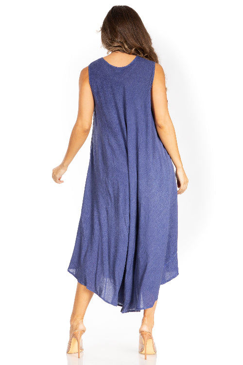 Woman wearing a blue sleeveless dress on a white background