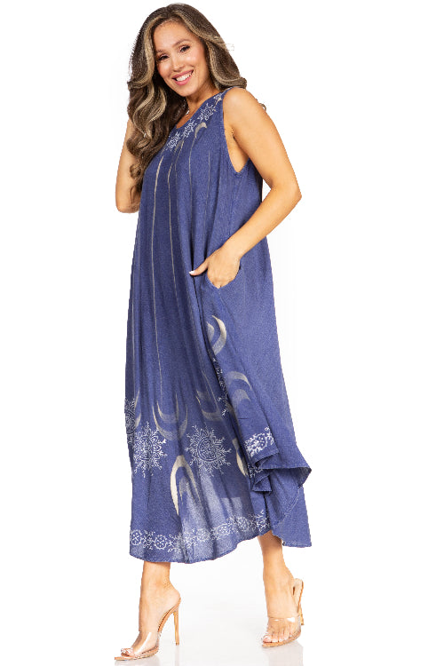 Woman wearing a blue dress with floral patterns on a white background