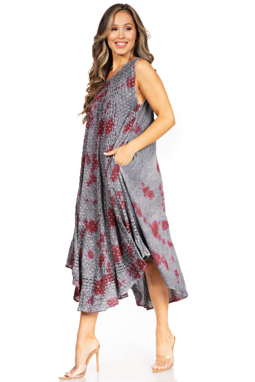 Woman wearing a gray floral dress on a white background
