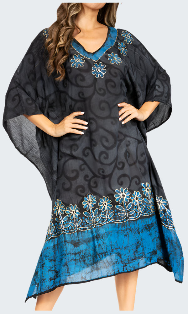 Black and blue patterned dress with floral designs on a white background