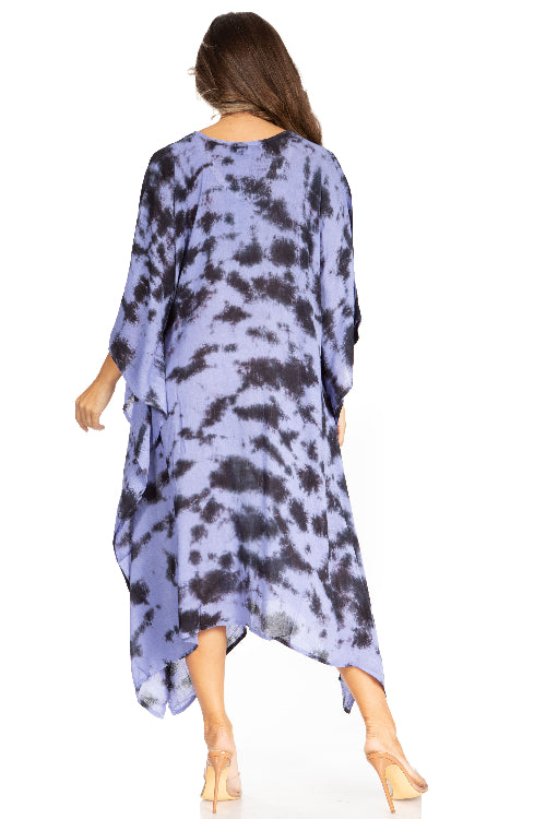 Woman wearing a tie-dye dress with a white background
