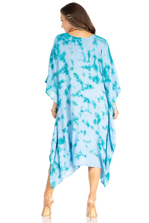 Woman wearing a blue and green tie-dye dress on a white background
