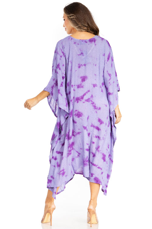 Woman wearing a purple tie-dye dress on a white background
