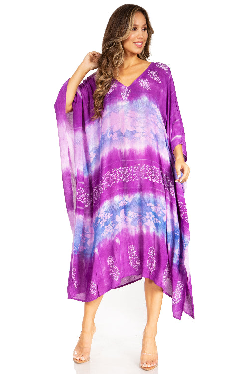 Woman wearing a purple tie-dye dress on a white background