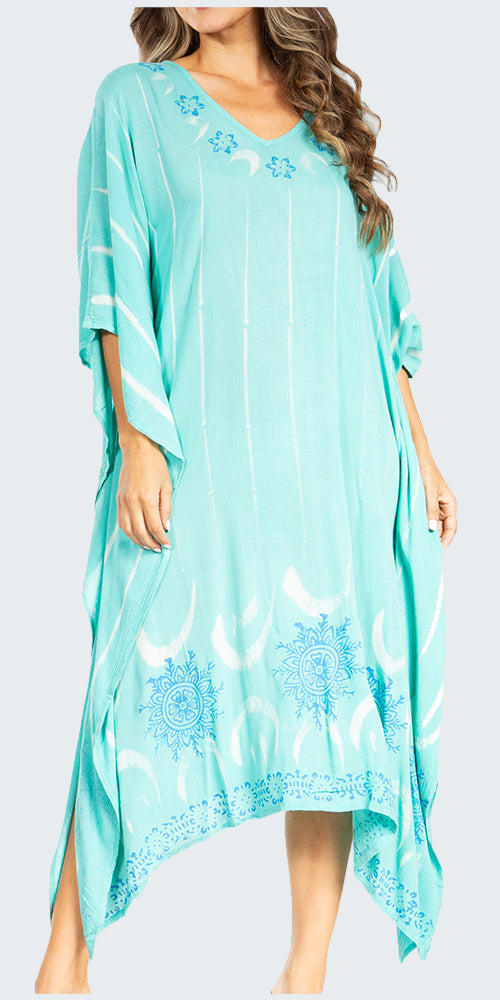 Woman wearing a light blue dress with floral patterns on a white background