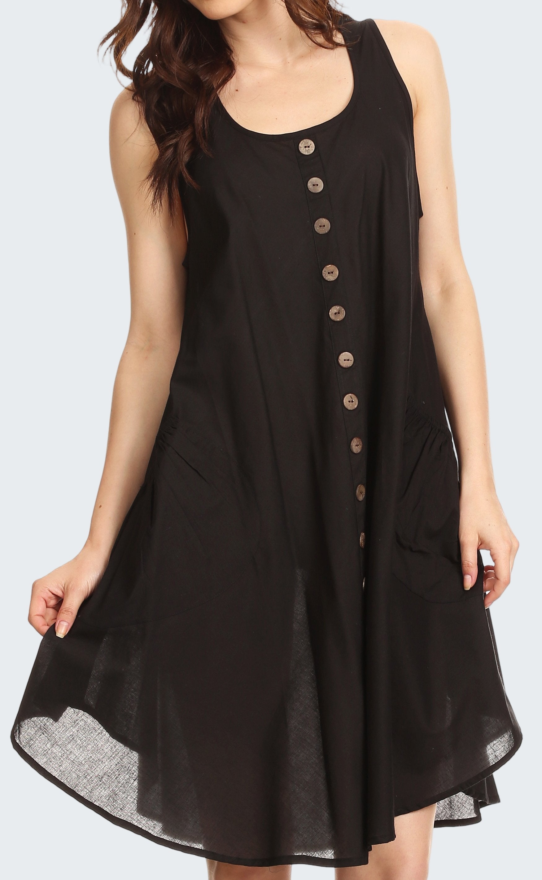 Black sleeveless dress with buttons on a white background