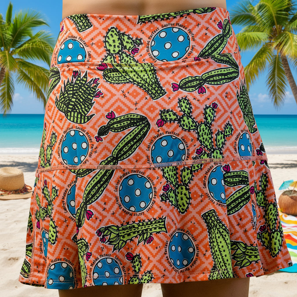 Skirt with cactus and polka dot pattern on an orange background