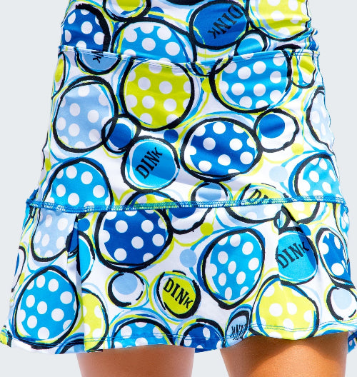 Colorful polka dot skirt with 'Dink' text on a white background