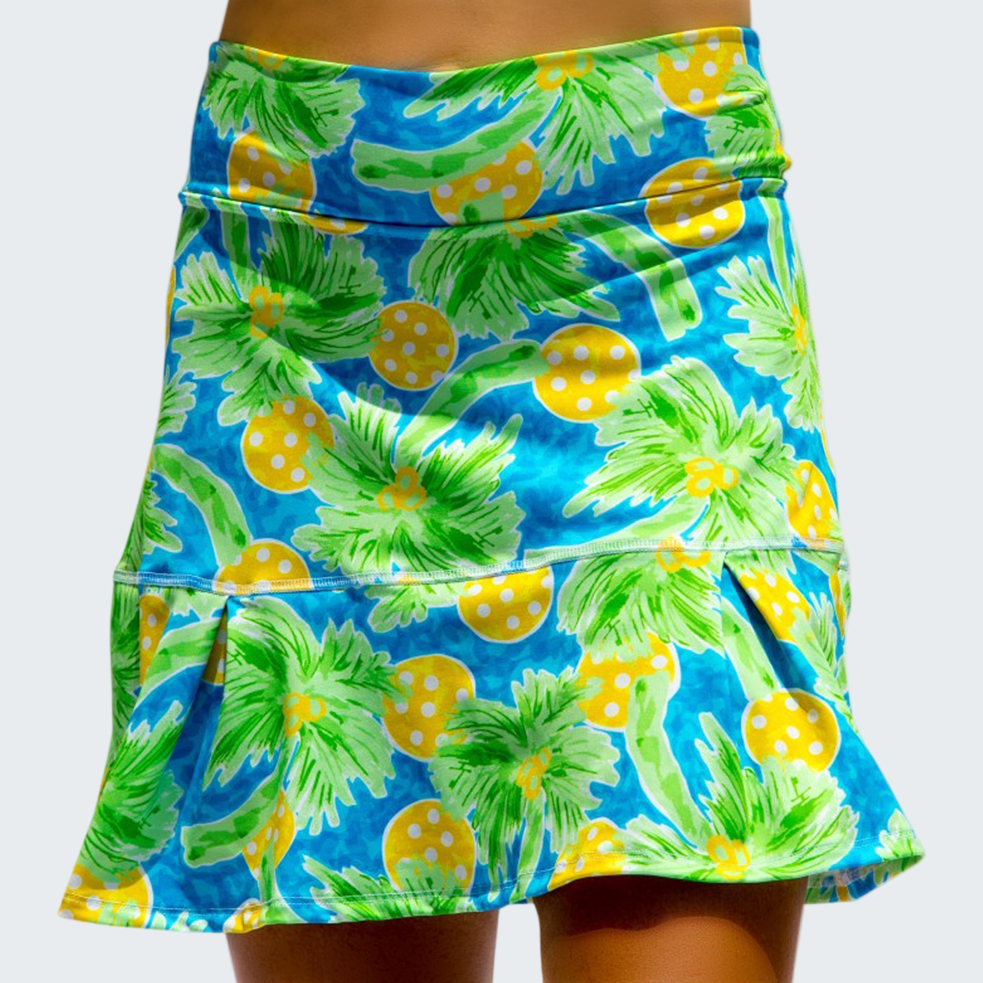 Skirt with pineapple and palm tree pattern on a blue background