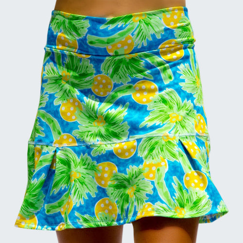 Skirt with pineapple and palm tree pattern on a blue background
