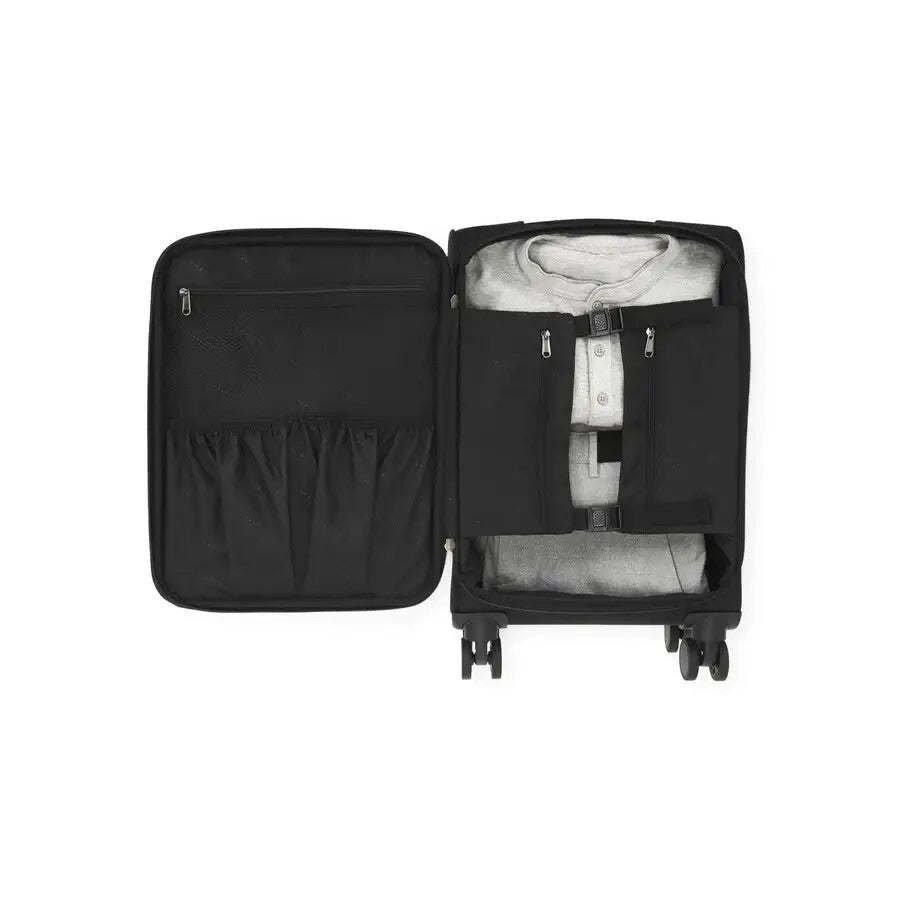 Black suitcase with open lid showing white clothing inside on a white background