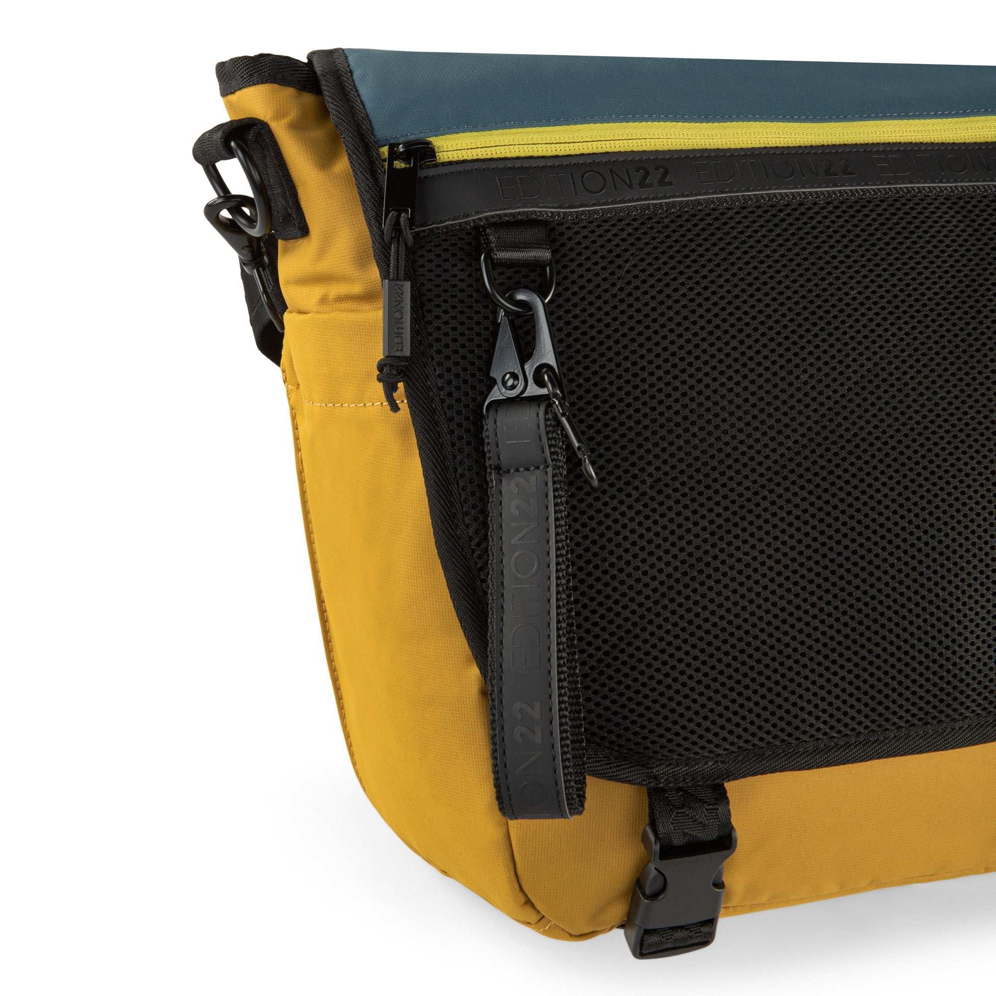 Yellow and blue bag with a black zipper on a white background