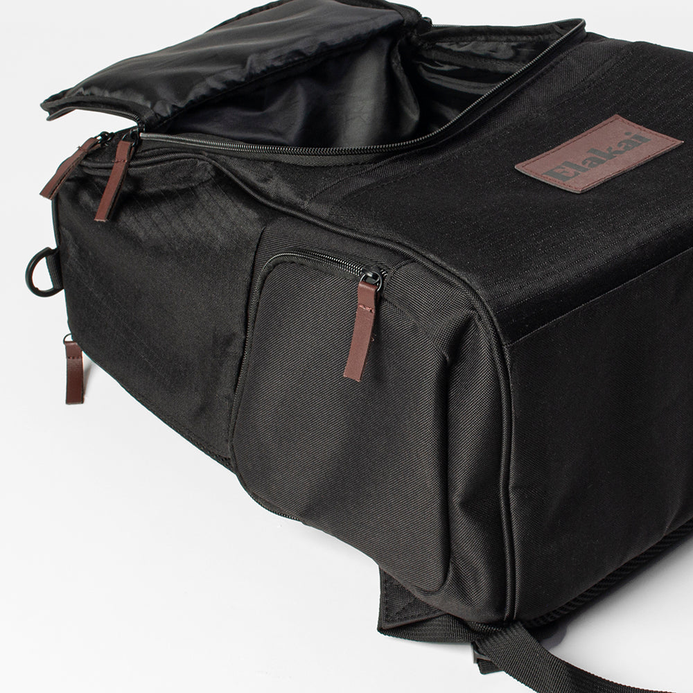 Black backpack with brown accents on a white background