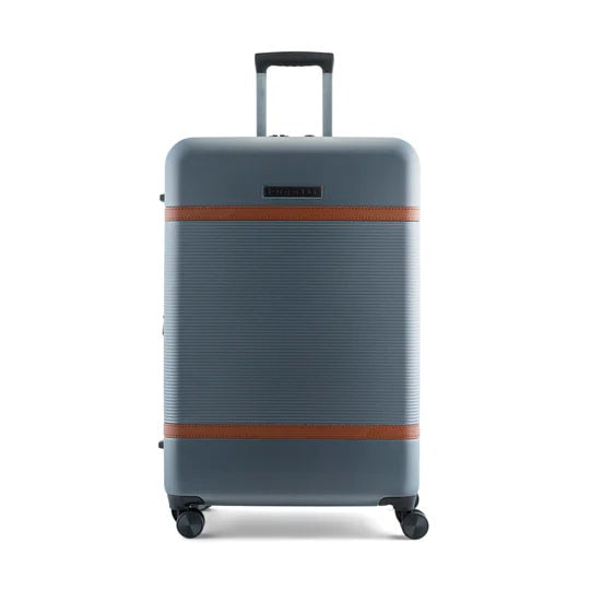 Gray suitcase with a brown stripe on a white background