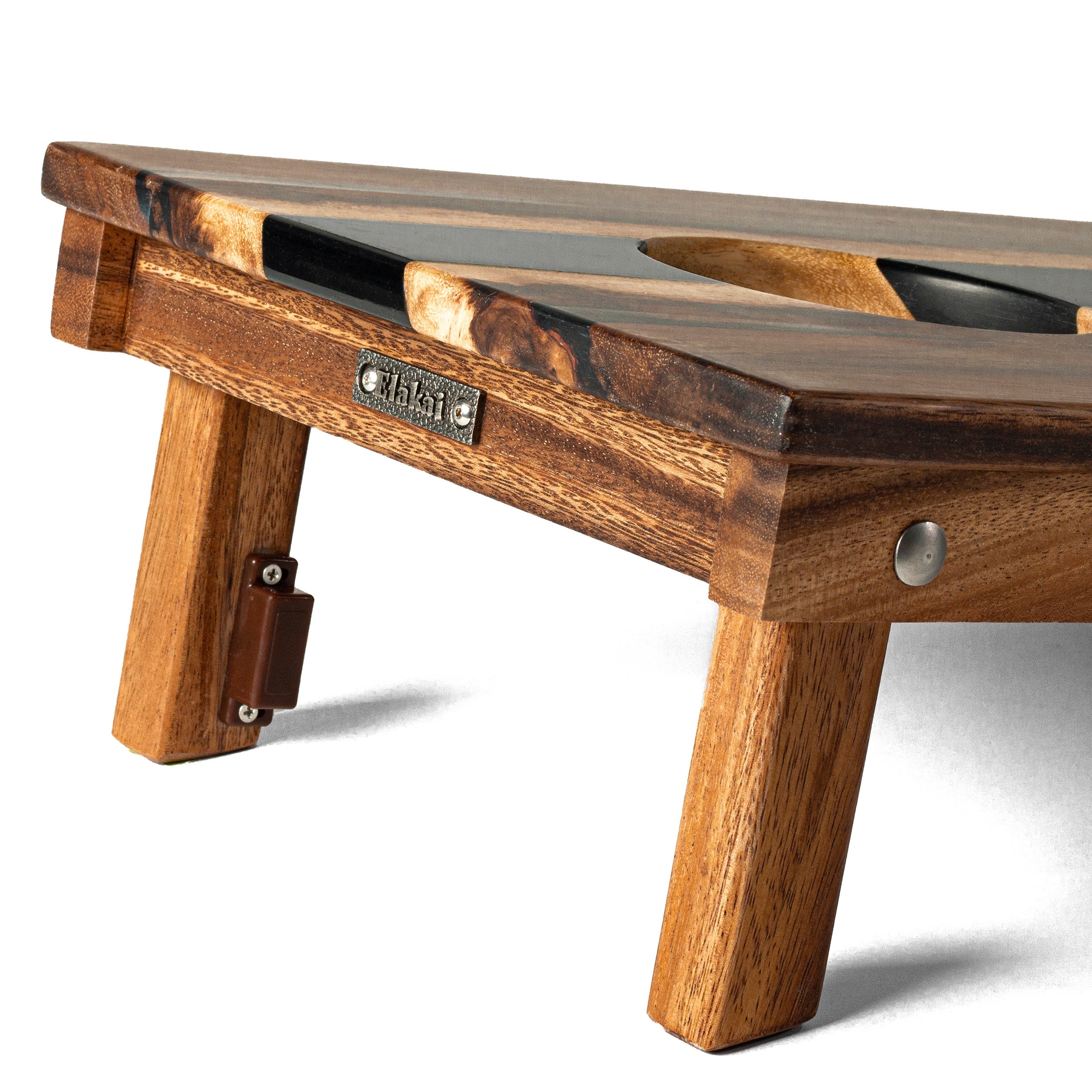 Wooden table with a visible brand logo on a white background