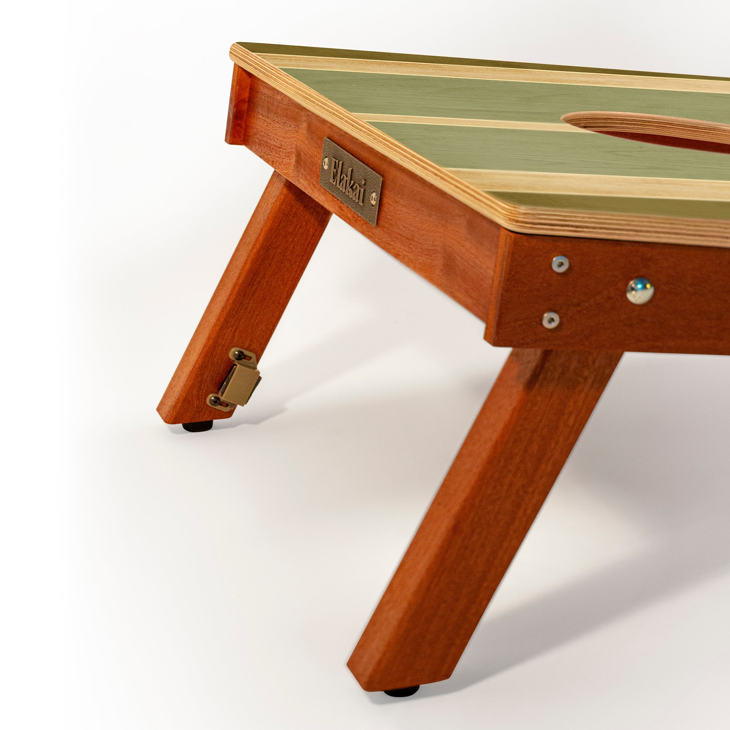 Wooden pet play table with green top on a white background