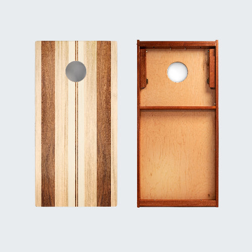 Wooden cornhole boards with a mix of wood tones on a white background