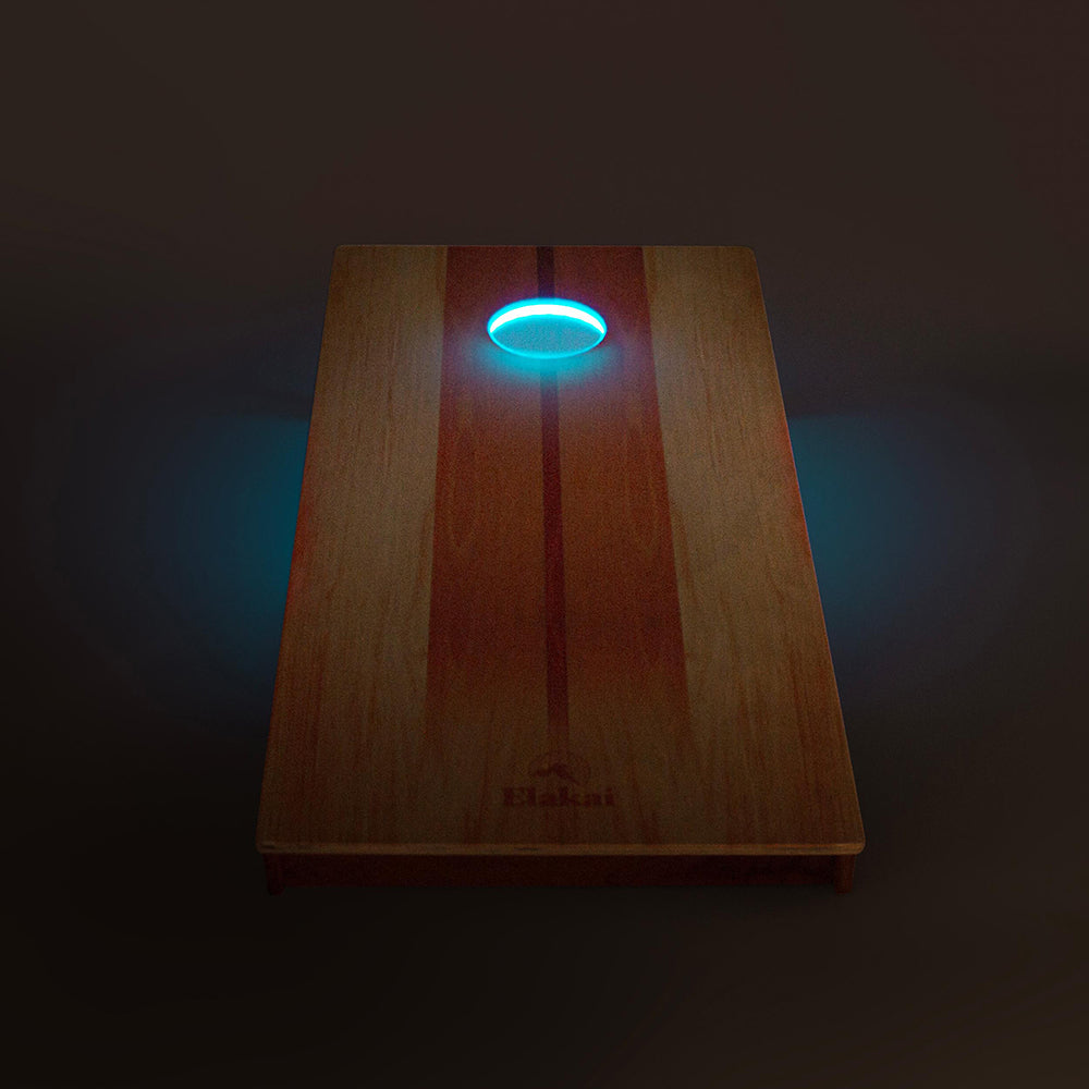 Wooden board with a glowing blue light on a dark background