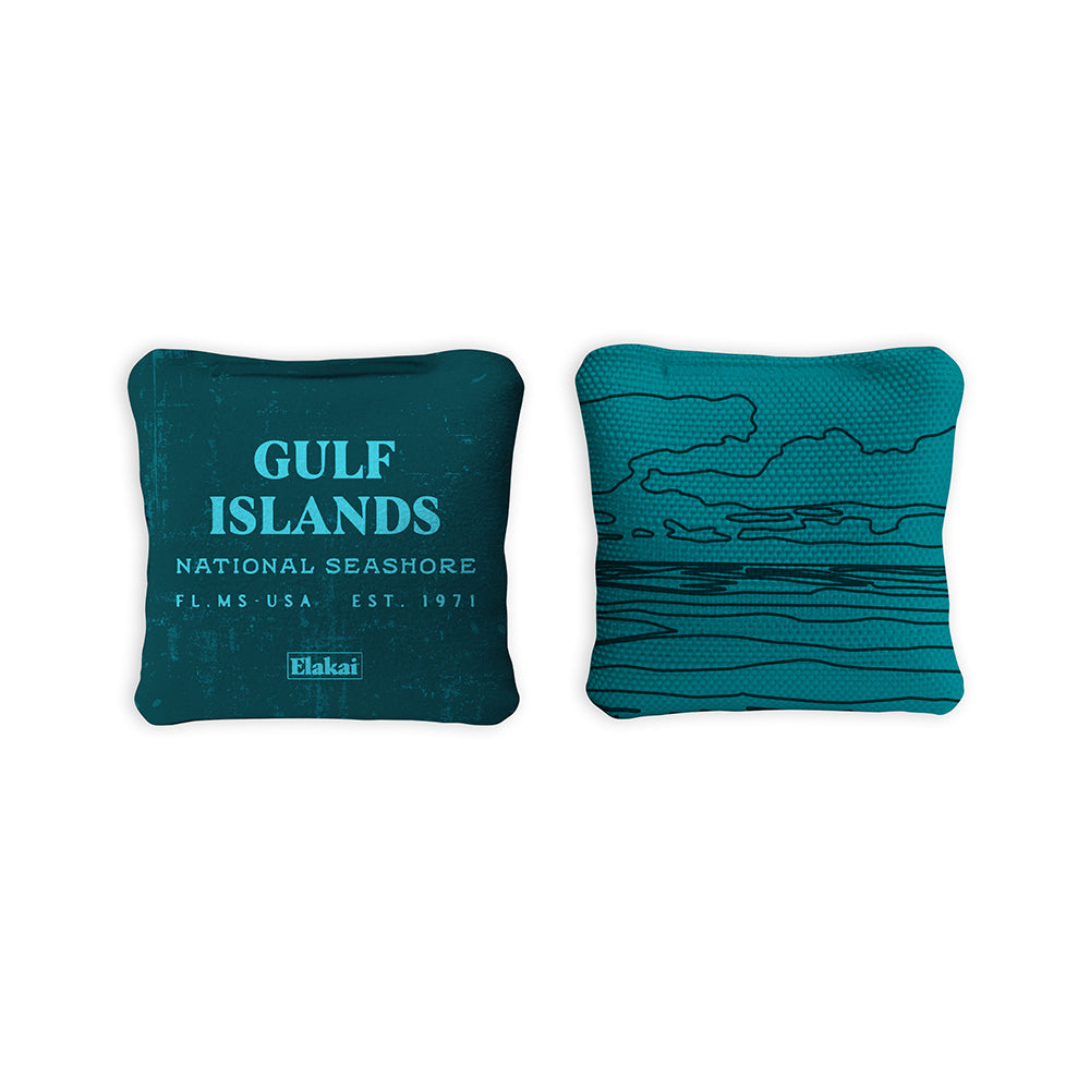 Two teal pillows with 'Gulf Islands National Seashore' text and a map design on a white background.