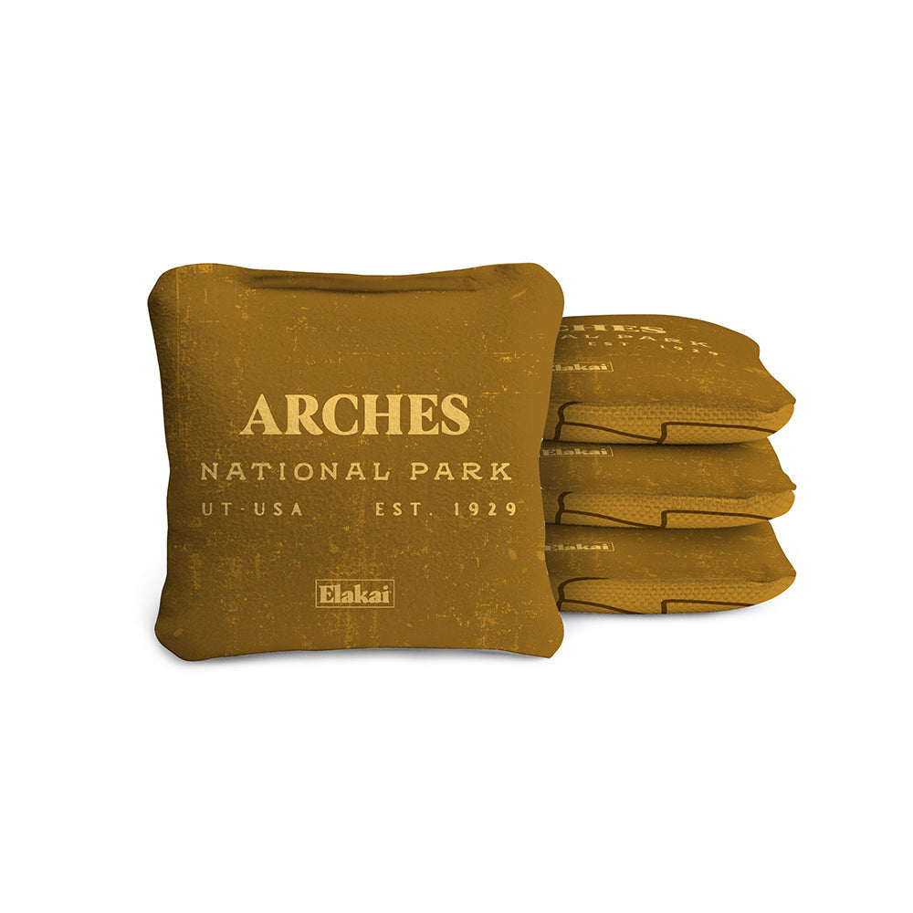 Brown bean bags with 'Arches National Park' text on a white background