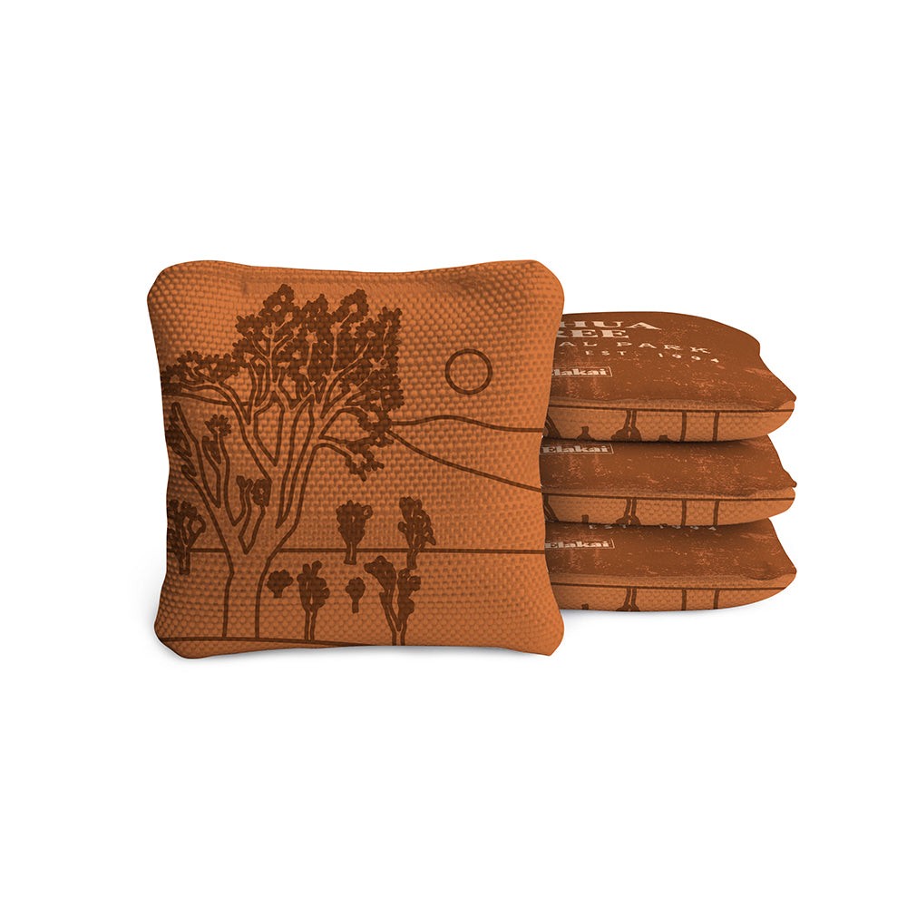 Brown bean bags with tree design on a white background