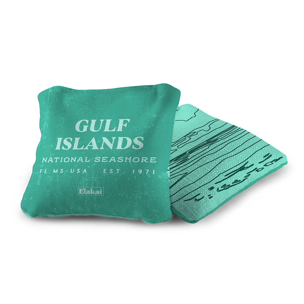 Teal towel with 'Gulf Islands National Seashore' text on a white background