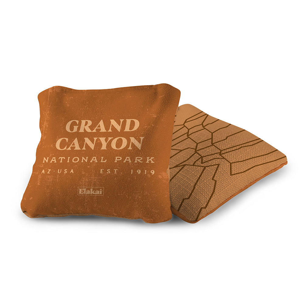 Brown pillow and coaster set with Grand Canyon National Park text on a white background