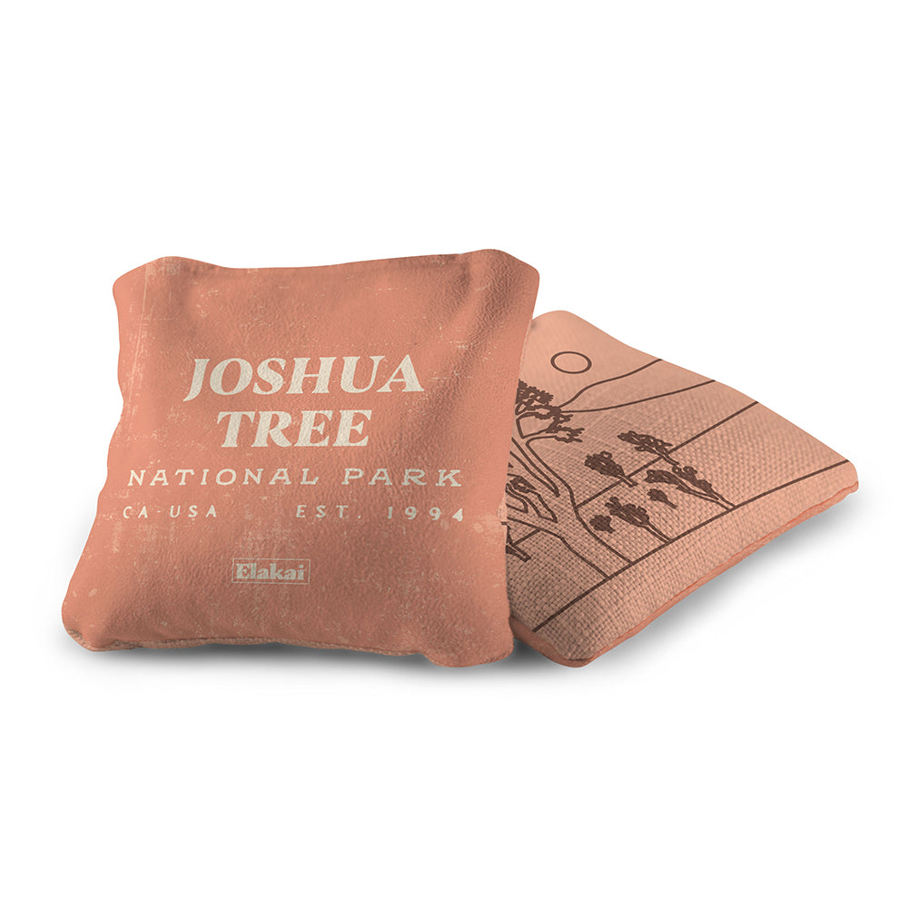 Two brown bags with 'Joshua Tree National Park' text on a white background