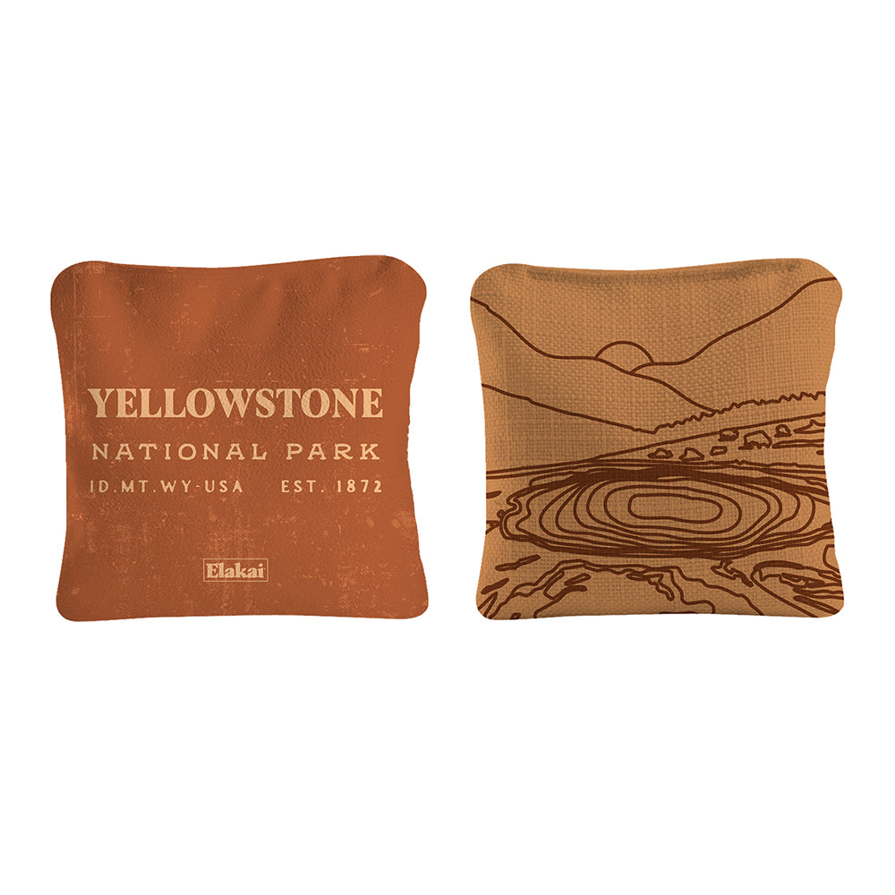 Two decorative pillows with Yellowstone National Park text and design on a white background