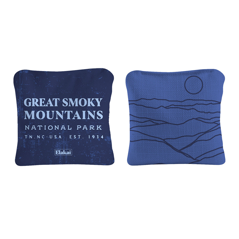 Two blue pillows with 'Great Smoky Mountains National Park' text and mountain design on a white background.