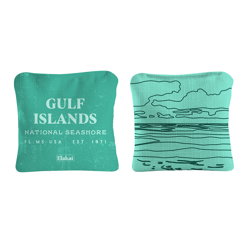 Two teal bean bags with 'Gulf Islands National Seashore' text and design on a white background