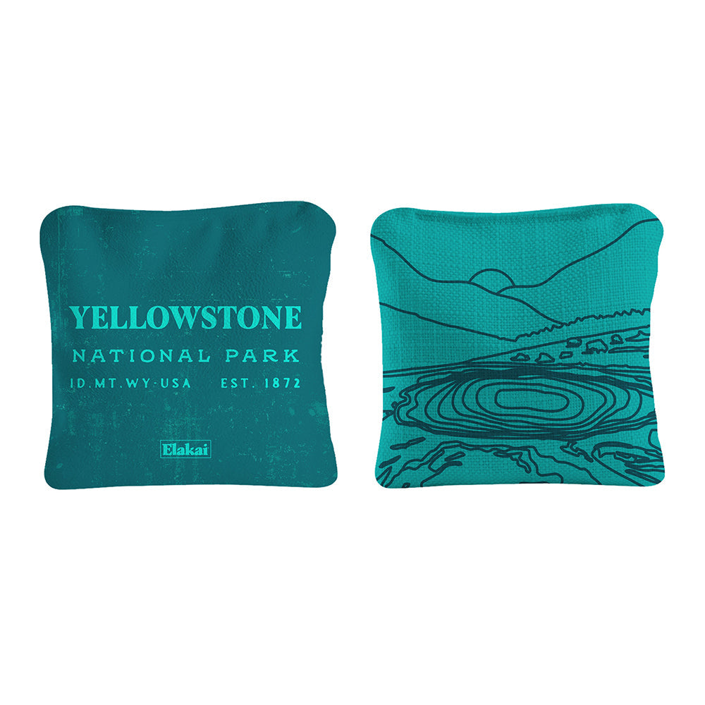 Two teal bean bags with Yellowstone National Park text and design on a white background