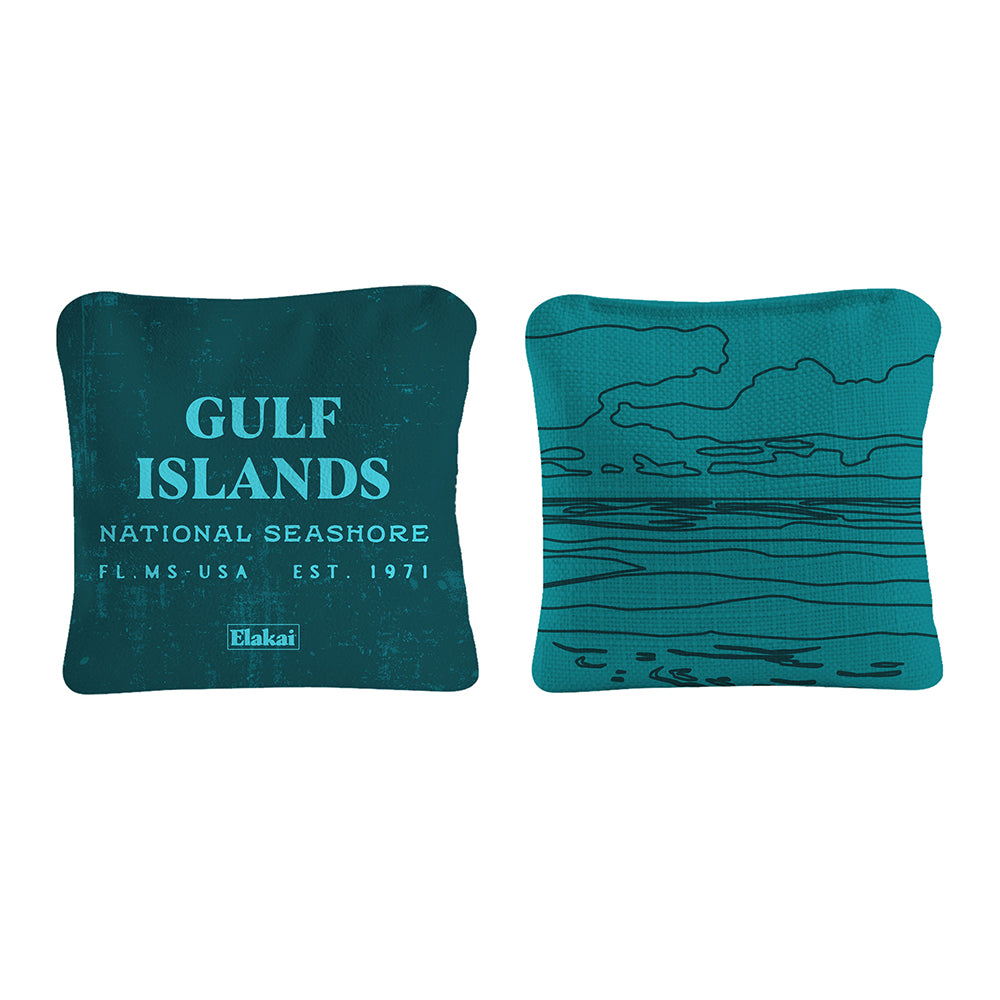 Two teal pillows with 'Gulf Islands National Seashore' text and a water graphic on a white background.