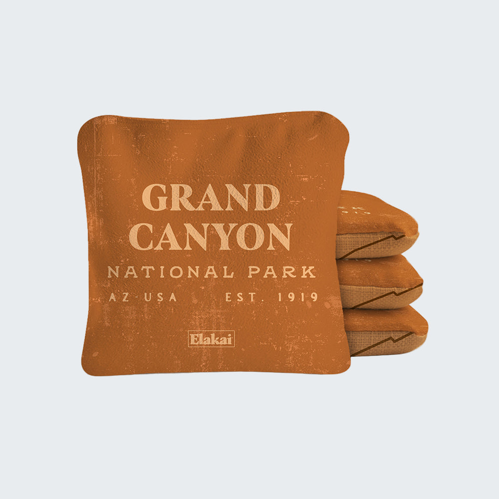 Folded blanket with Grand Canyon National Park text on a white background