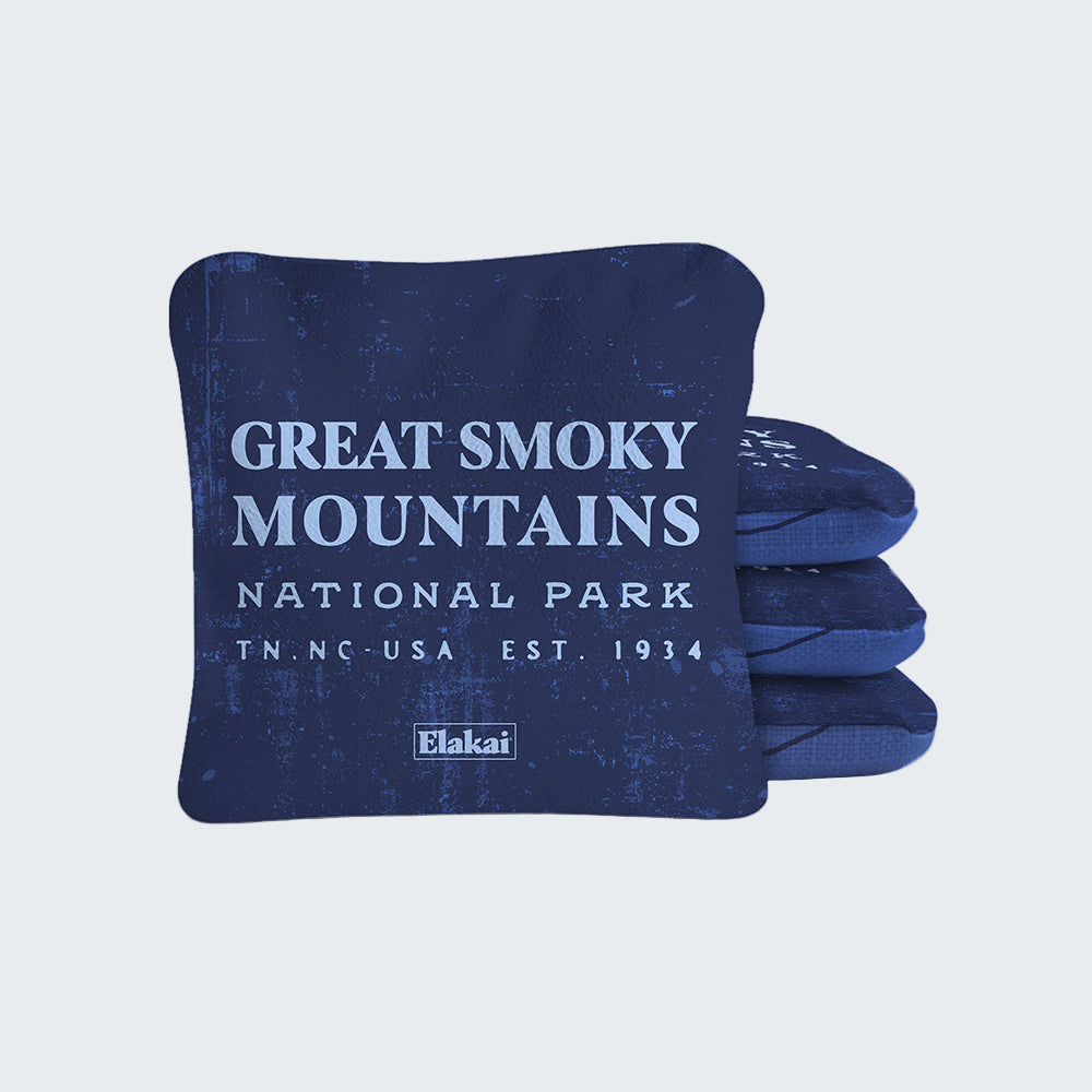 Blue pillow with 'Great Smoky Mountains National Park' text on a white background