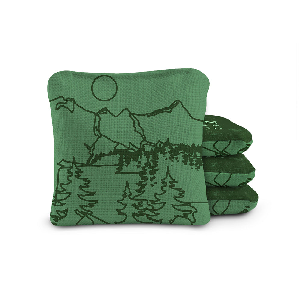 Green bean bags with mountain and tree design on a white background