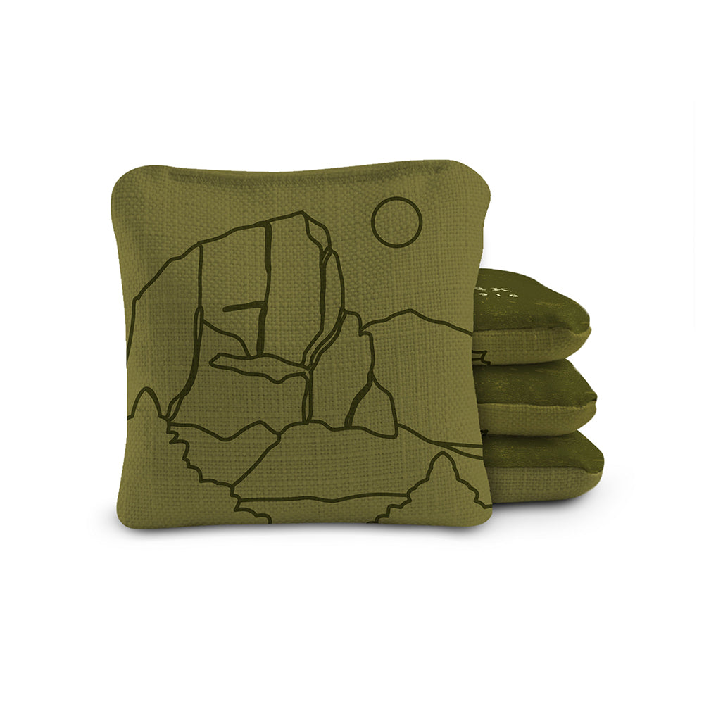 Green gloves with a mountain design on a white background