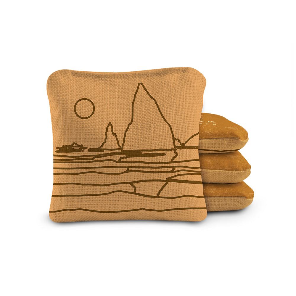 Set of three brown bean bags with a landscape design on a white background