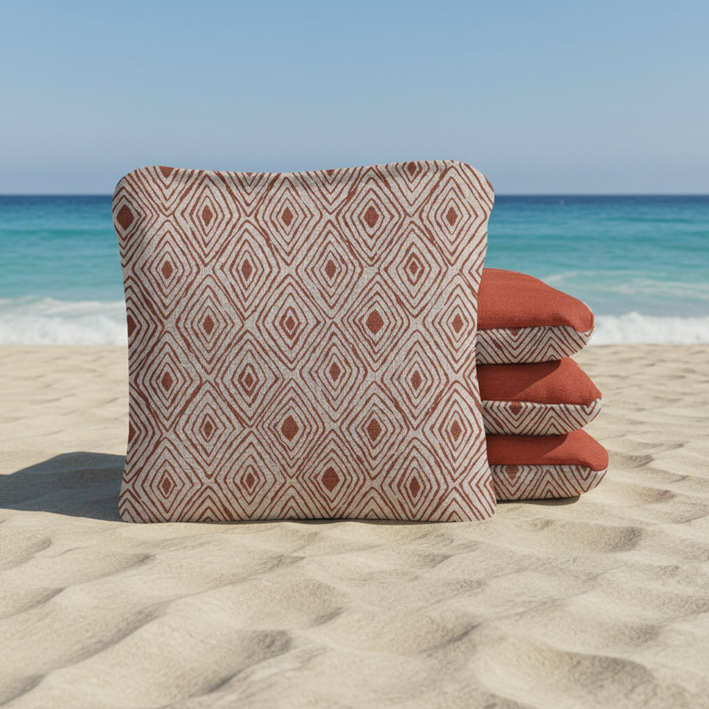 Set of three patterned cushions on a white background