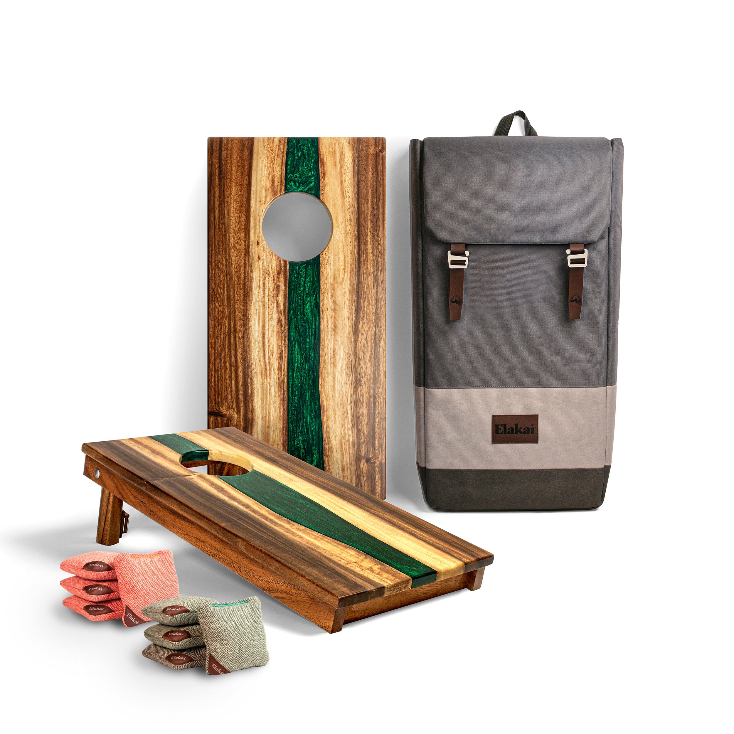 Cornhole board, wooden bag, and gray backpack on a white background