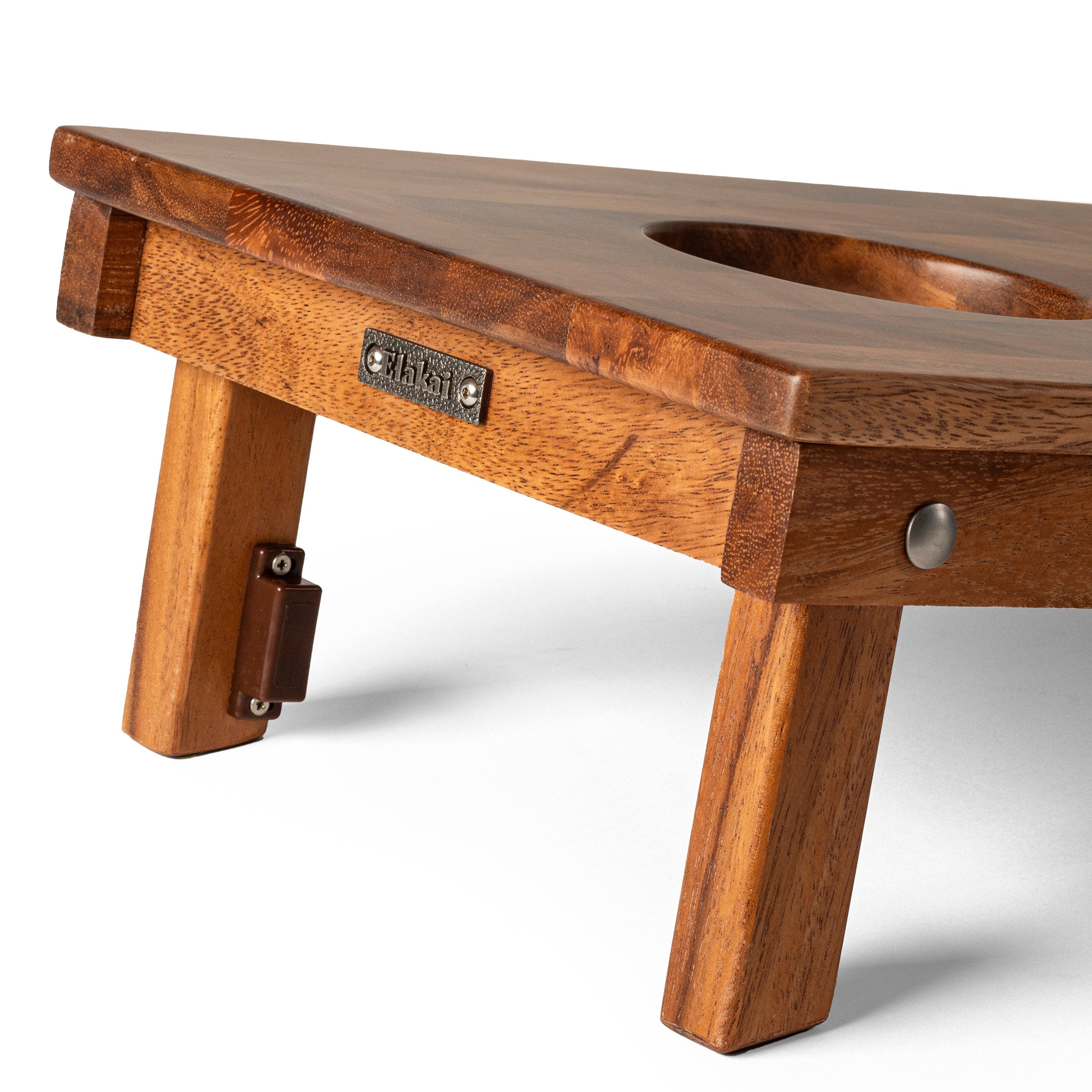 Wooden dog feeding station with a white background