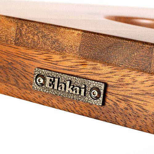 Wooden product with 'Elakai' branding on a white background